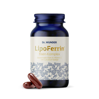 Dr. Wunder LipoFerrin Eisen-Komplex blaue Glasflasche mit zwei dunkelroten Kapseln davor