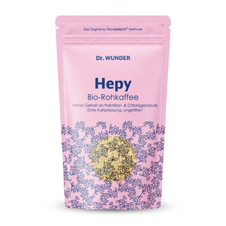Dr. Wunder HEPY Kaffee BIO – rosafarbener Standbeutel mit Aufschrift Bio-Rohkaffee, weißer Hintergrund