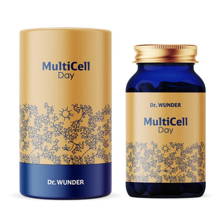 Dr. Wunder MultiCell Day goldene Verpackungsdose neben blauer Glasflasche mit goldenem Etikett